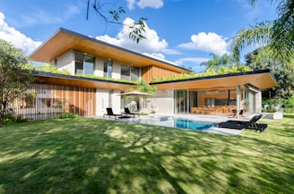 A modern house with a pool in the yard