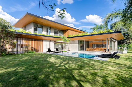 A modern house with a pool in the yard