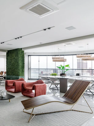 A living room filled with furniture and a large window