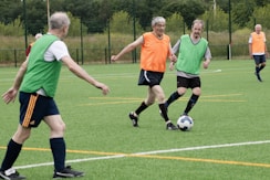 A group of men playing a game of soccer