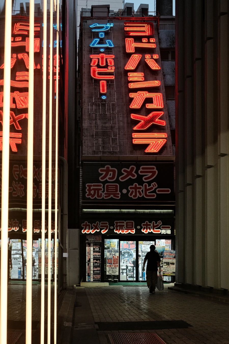 Arriving at a neon-lit entrance at night