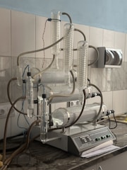 A kitchen counter top with a machine on top of it