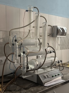 A kitchen counter top with a machine on top of it