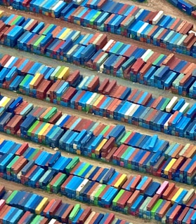 A large group of colorful containers sitting next to each other