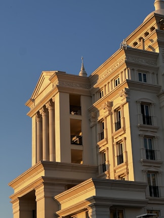 A tall building with a clock on the top of it