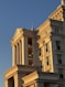 A tall building with a clock on the top of it