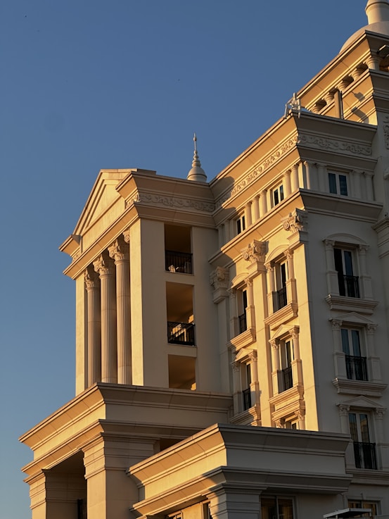 A tall building with a clock on the top of it