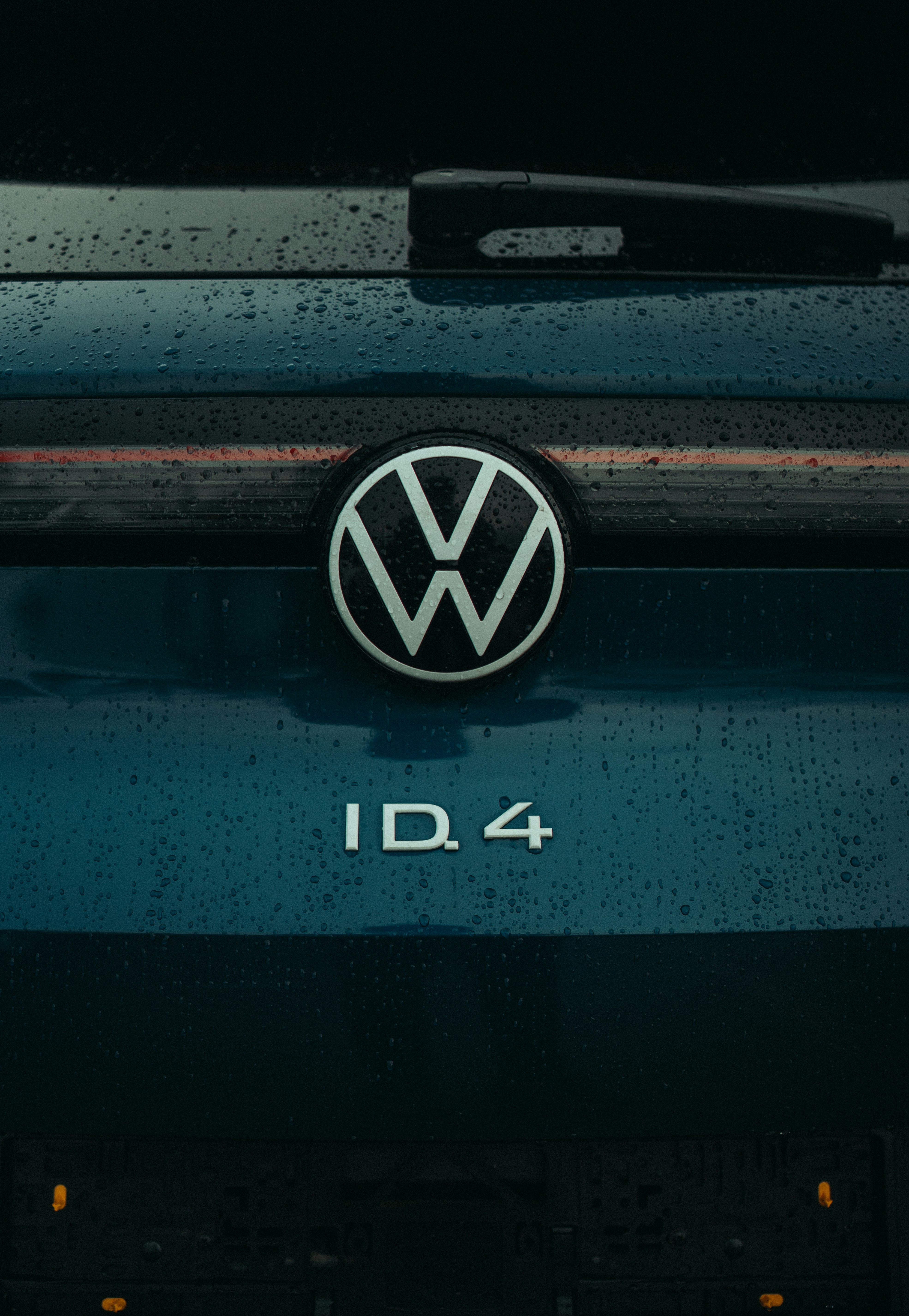 A close up of a volkswagen logo on a car