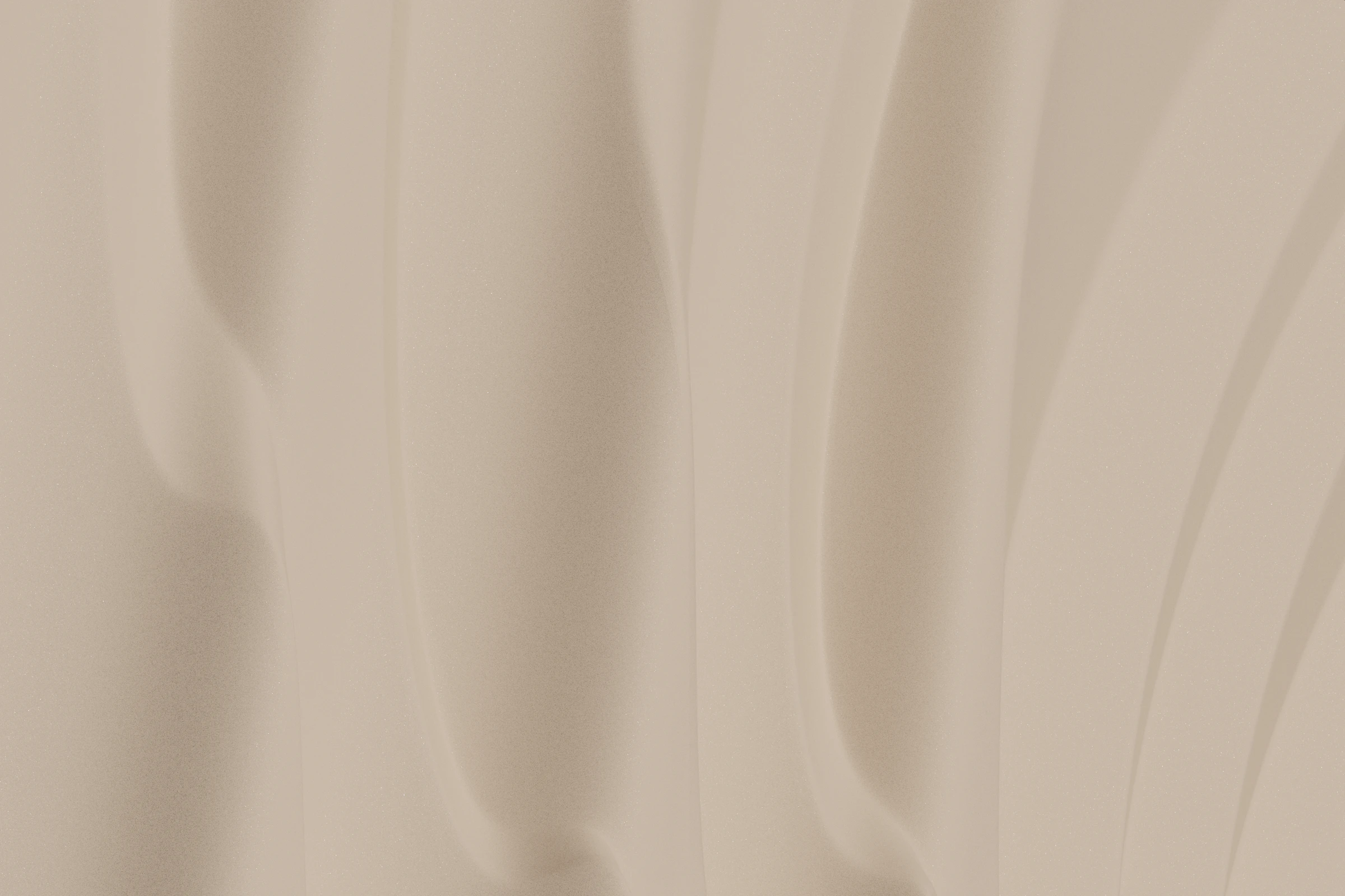 Soft draped sand-toned satin in low light