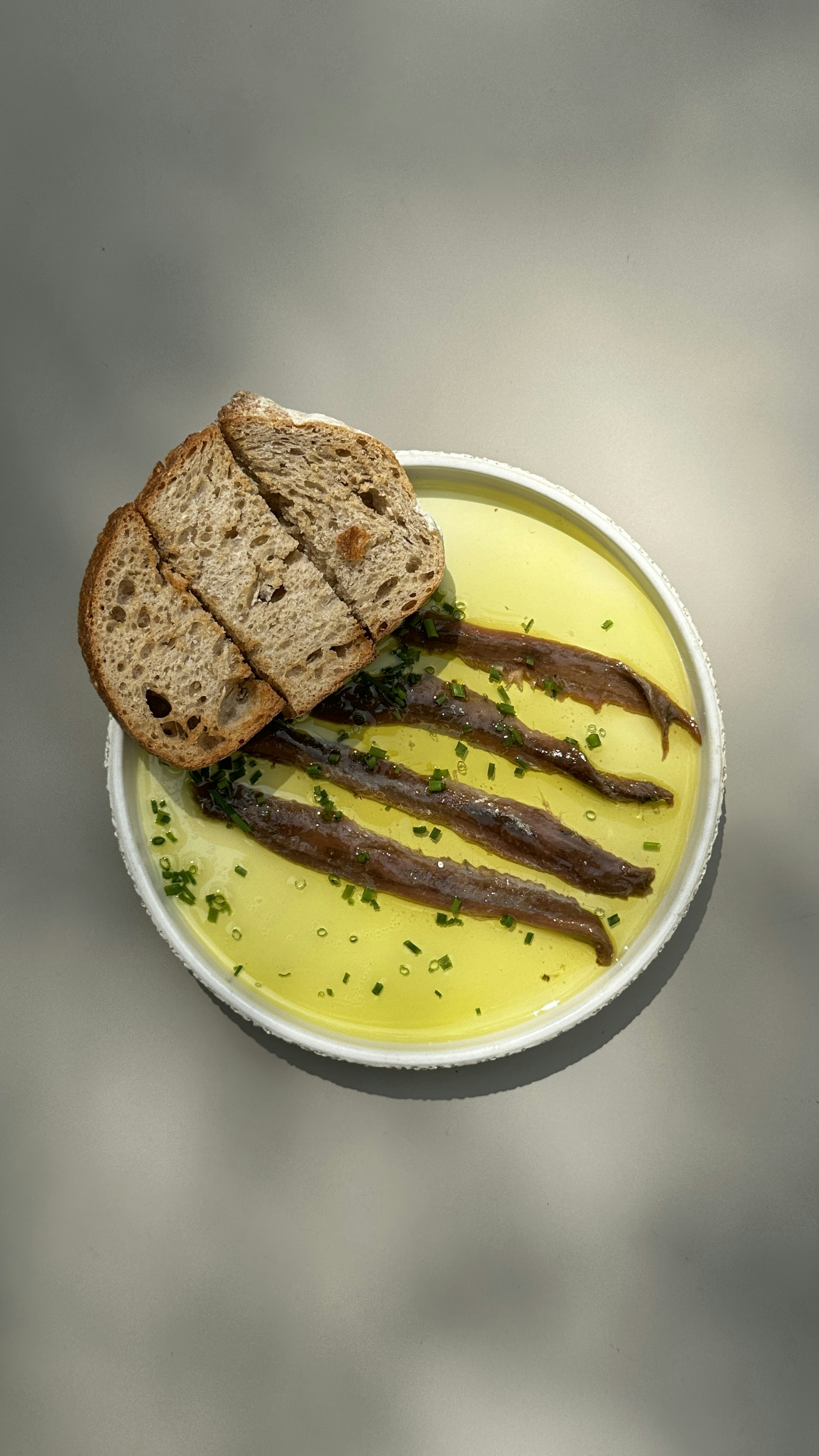 A plate of food with bread and mustard
