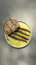 A plate of food with bread and mustard