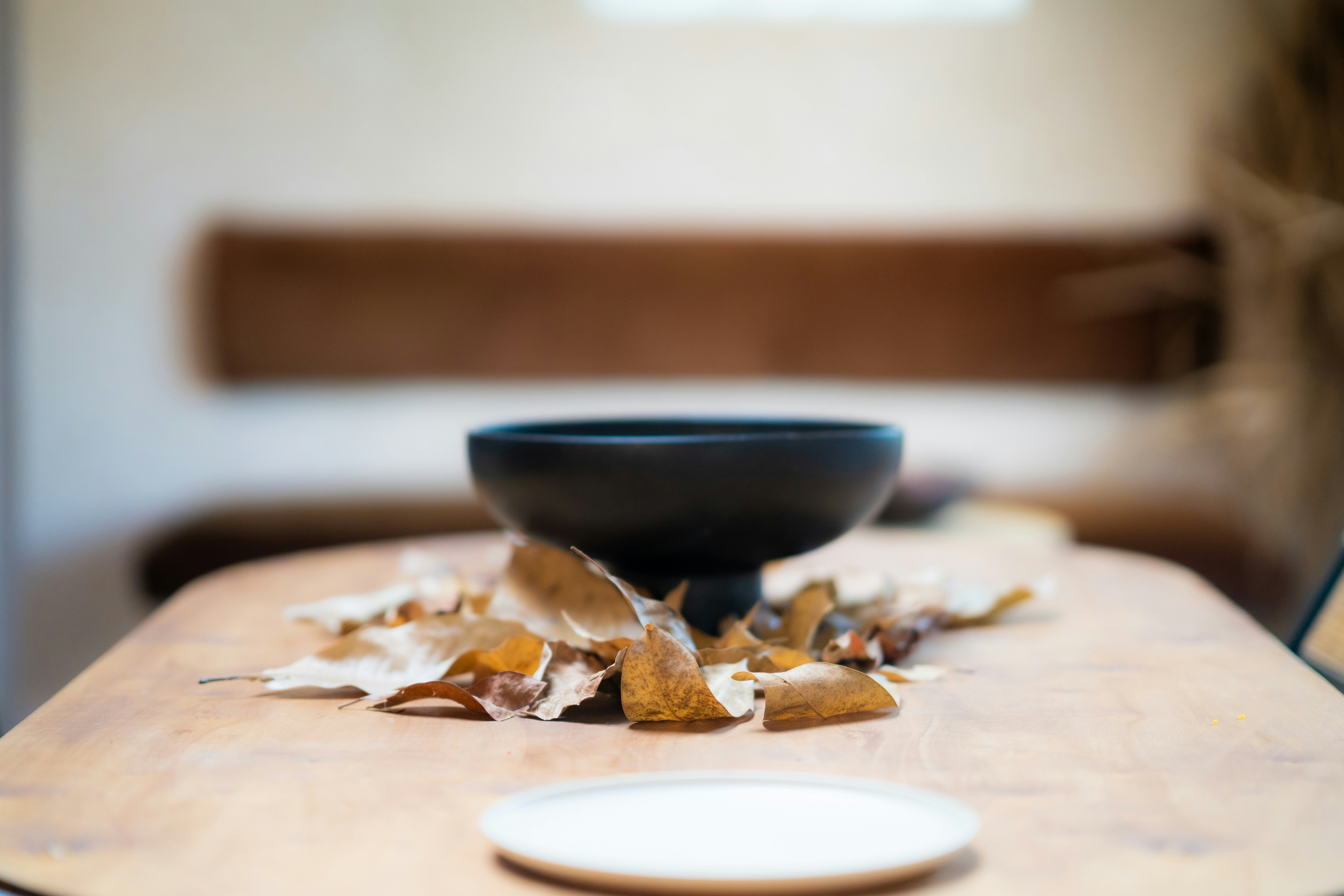 Tea leaves in a wooden bowl