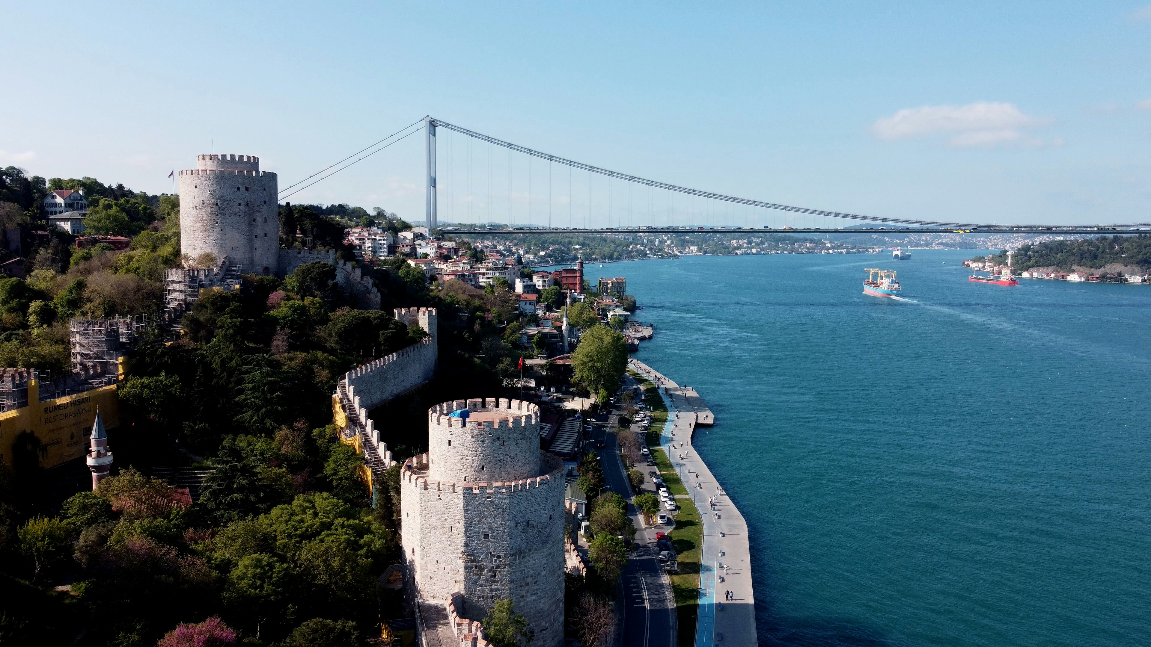 An aerial view of a river and a bridge