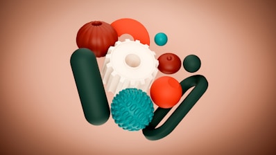 A group of different colored objects on a brown background
