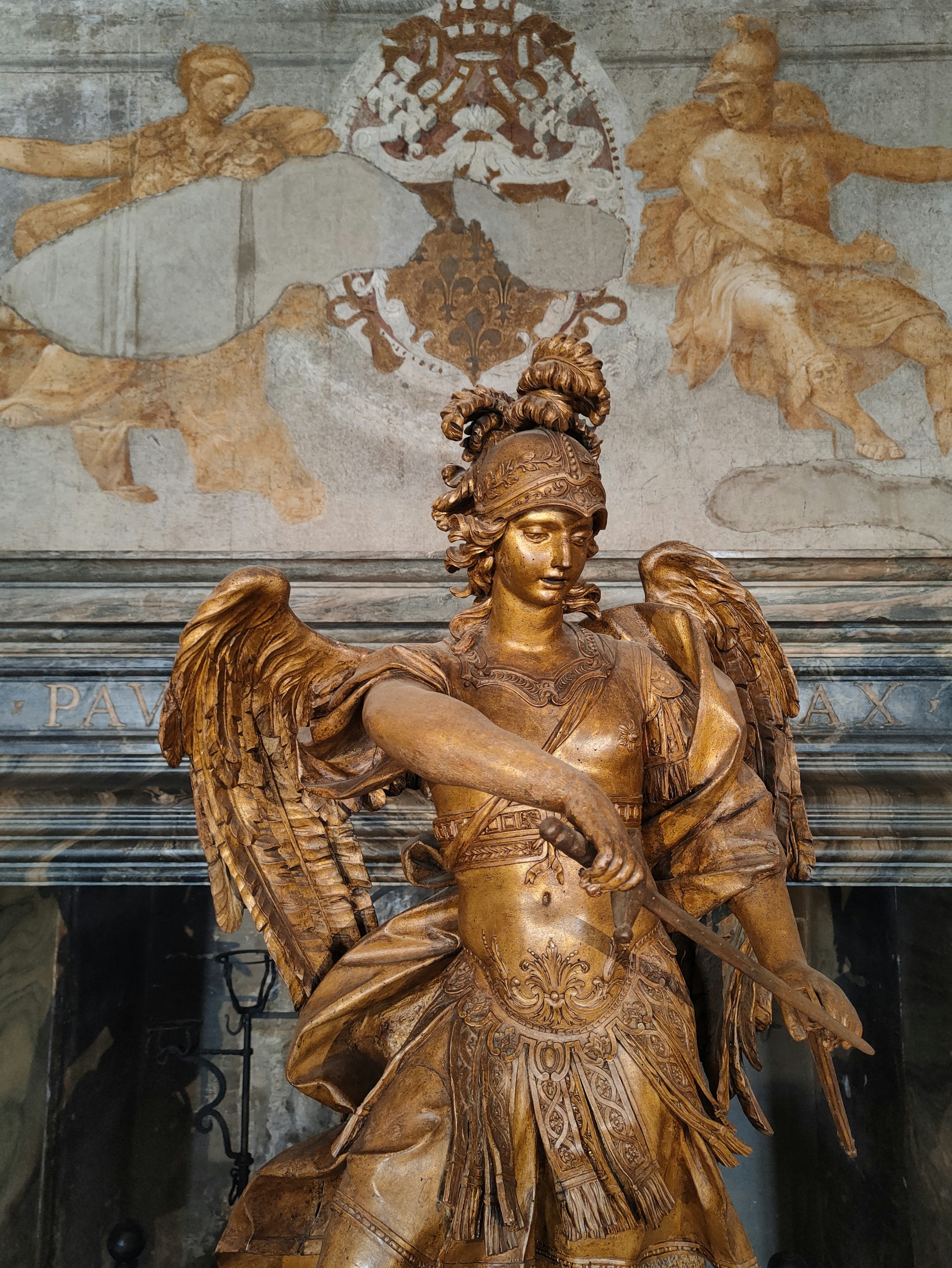 A statue of a woman holding a bird