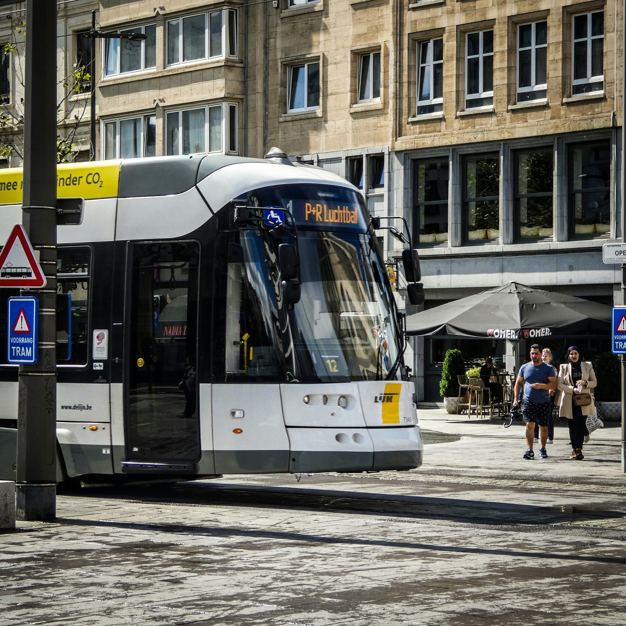 A public transit bus on a city street