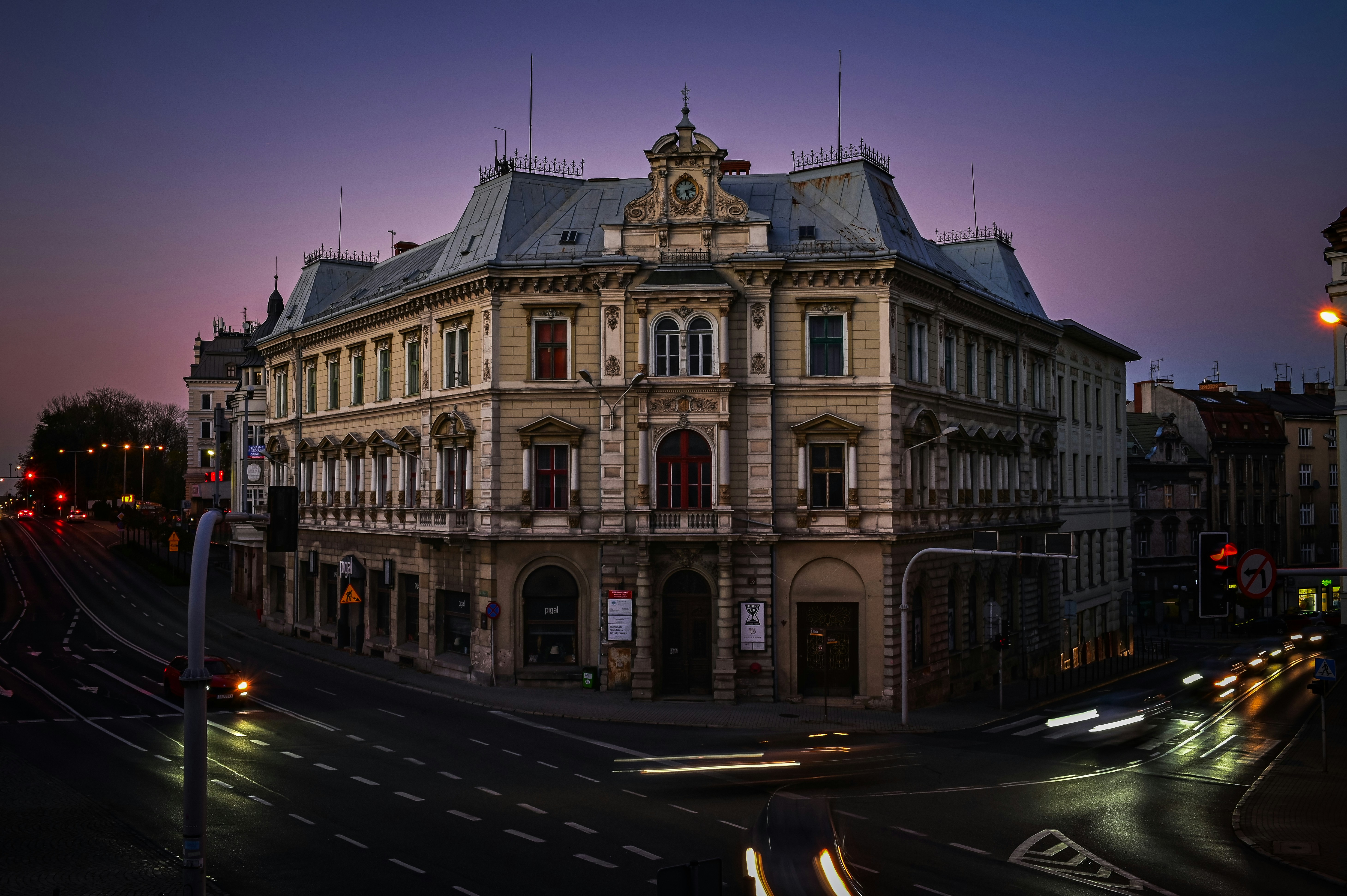 A large building sitting on the side of a road