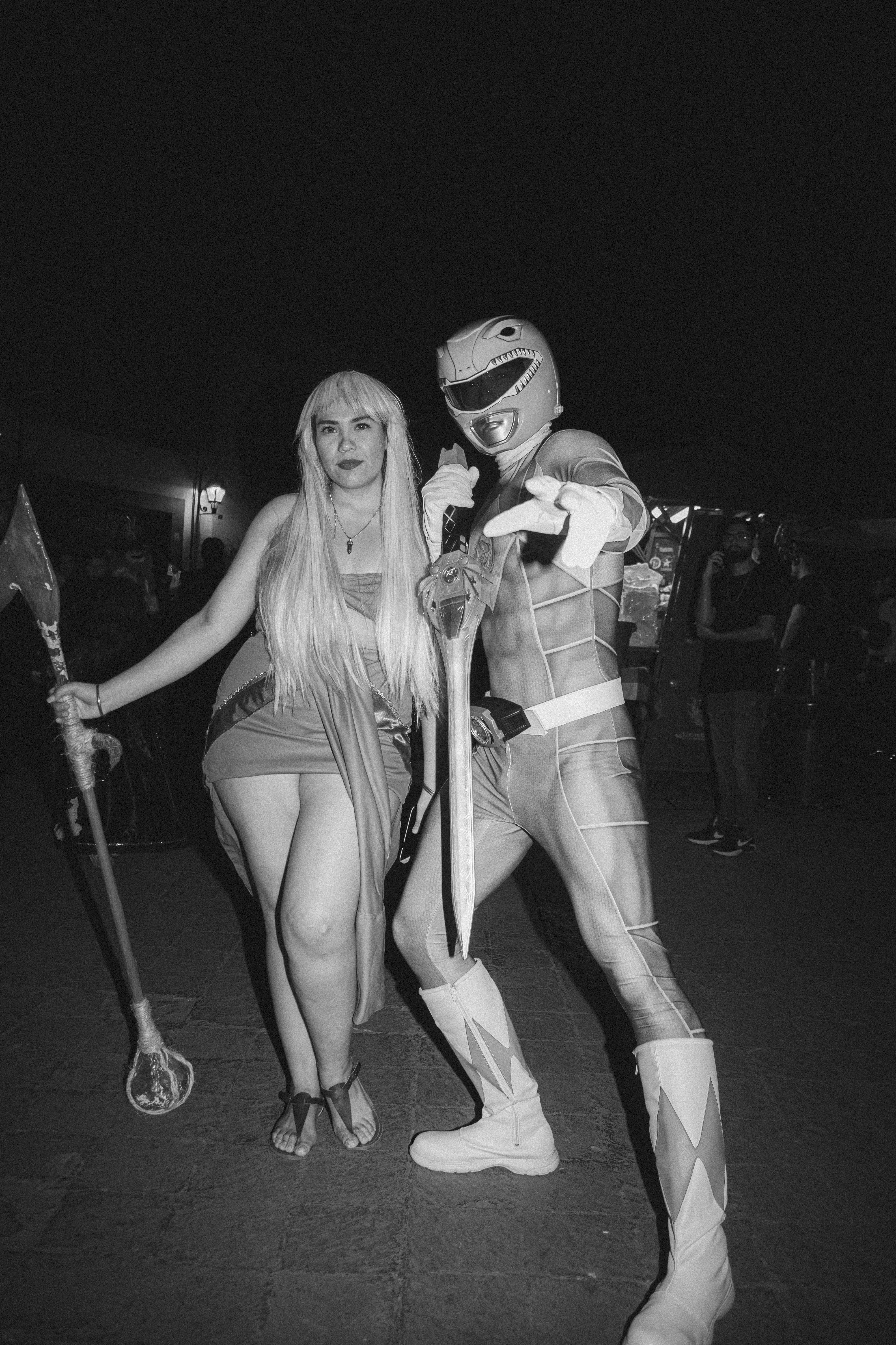 A couple of people that are dressed up in costumes