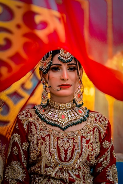 A woman in a red and gold outfit