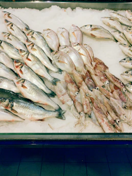 A bunch of fish that are on a table