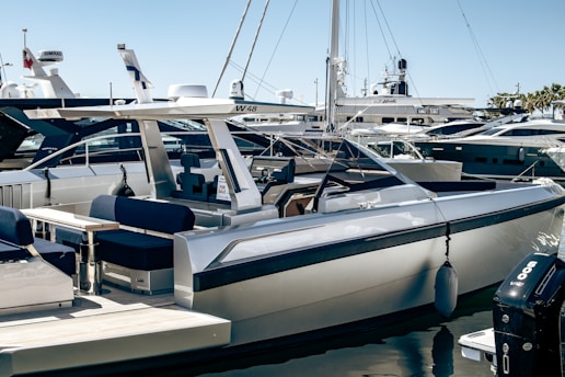 A group of boats docked at a marina