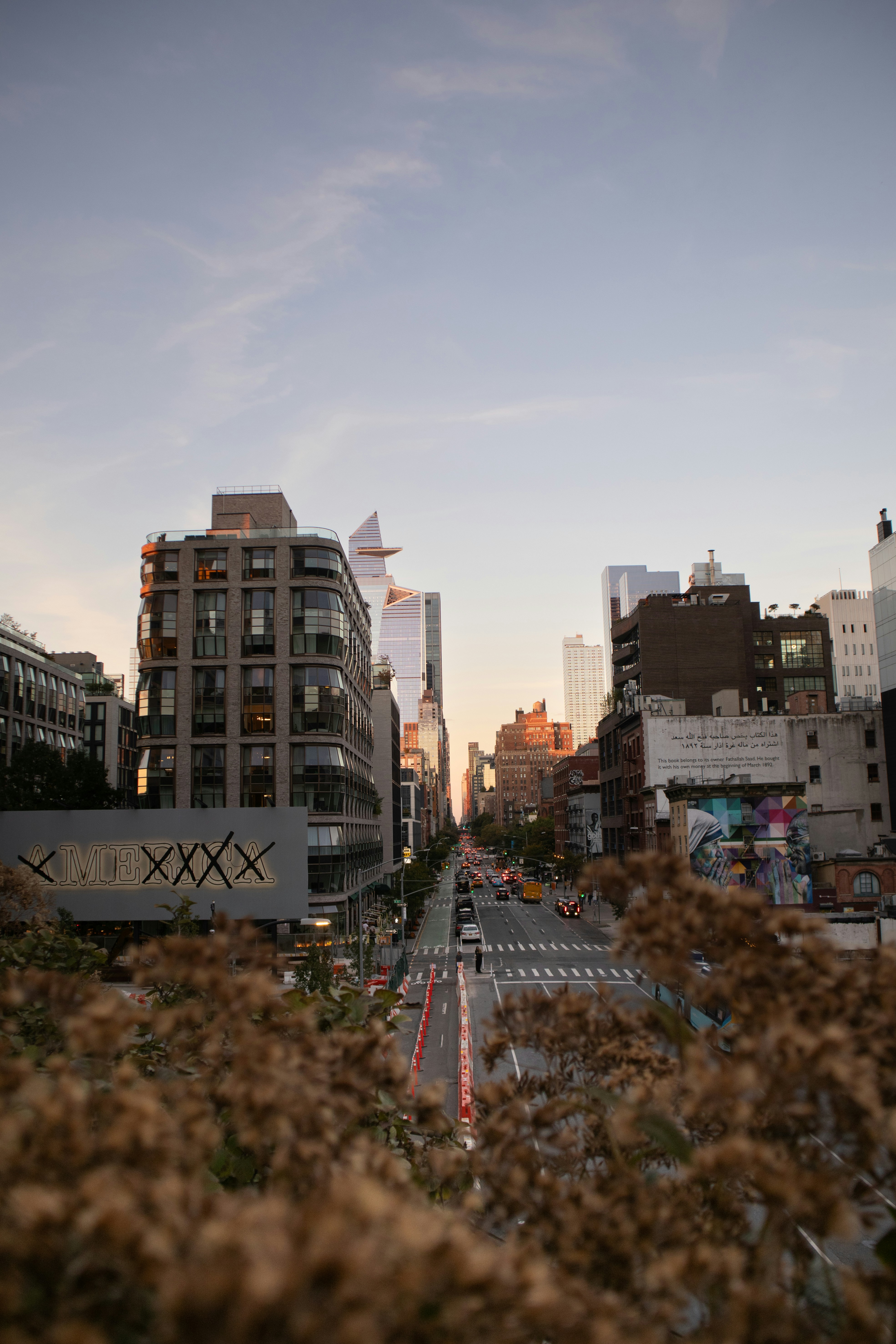 A city street with tall buildings in the background photo – Free New ...