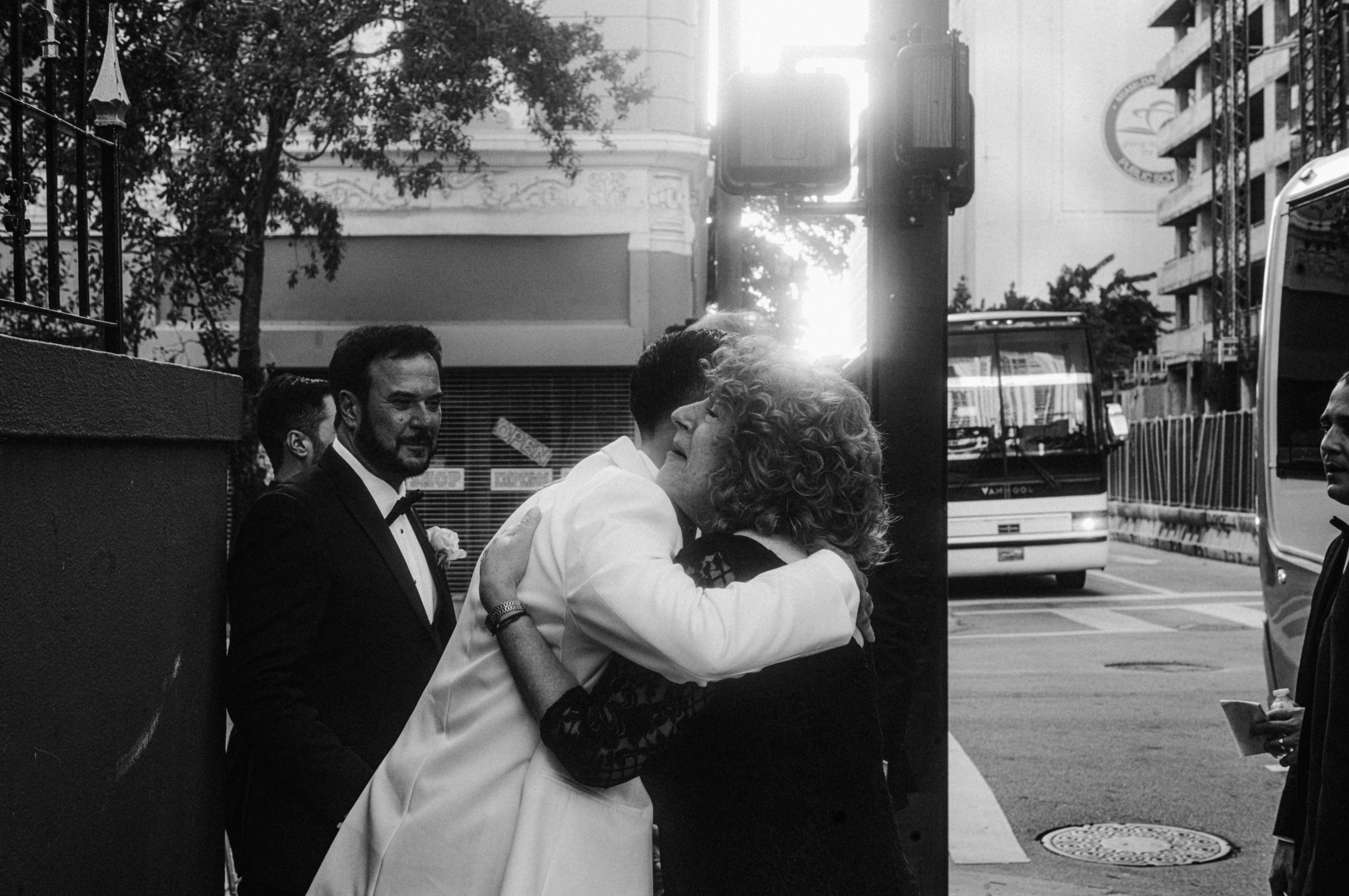 Couple hugging on street