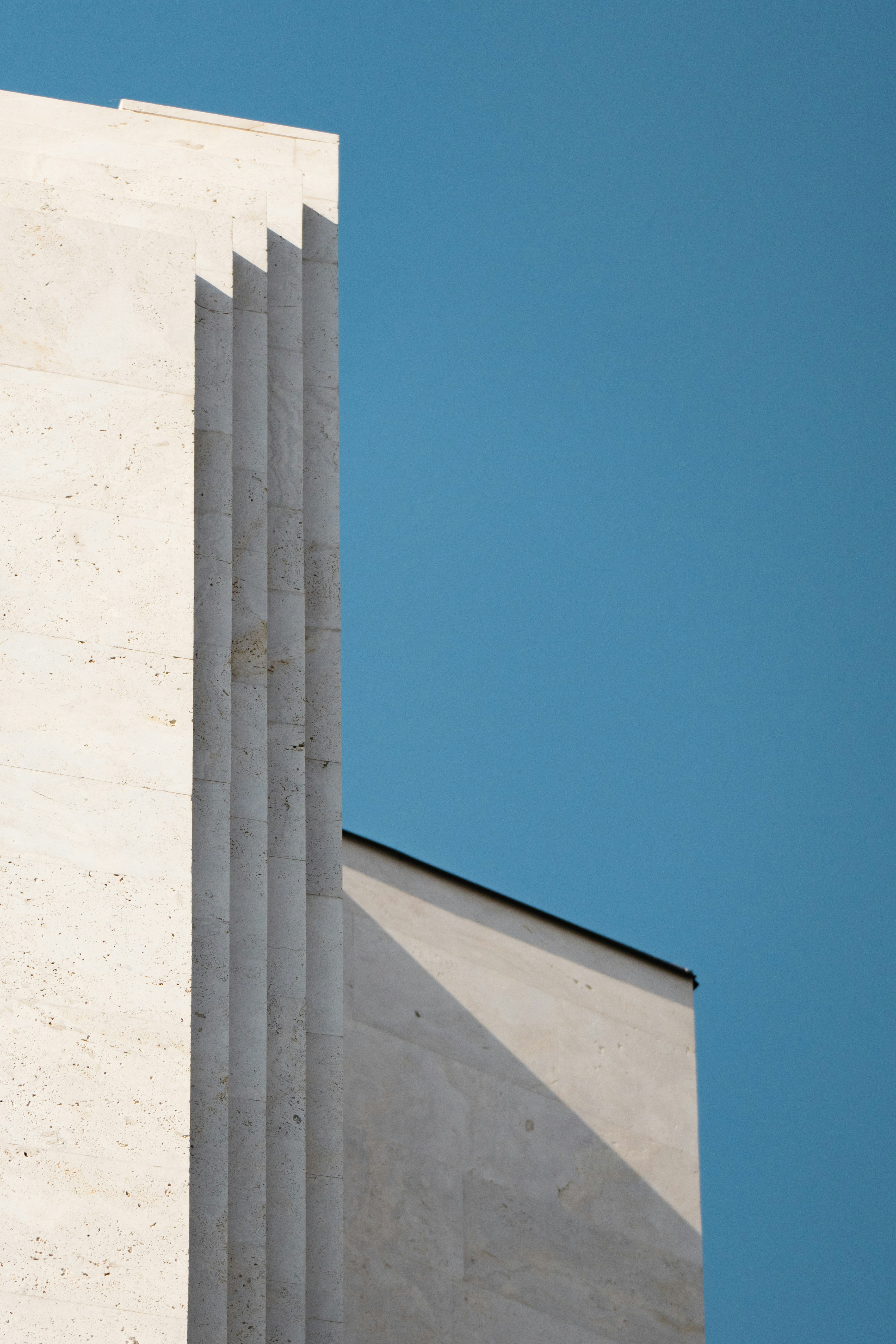 A tall building with a clock on the side of it
