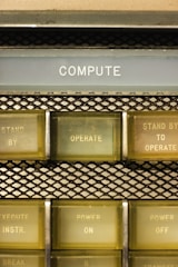 A close up of a computer keyboard with different types of buttons