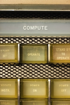 A close up of a computer keyboard with different types of buttons