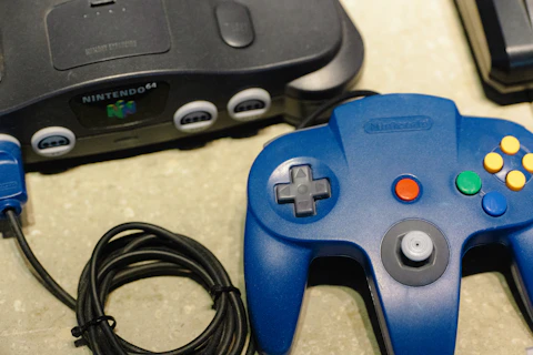 A couple of game controllers sitting on top of a table