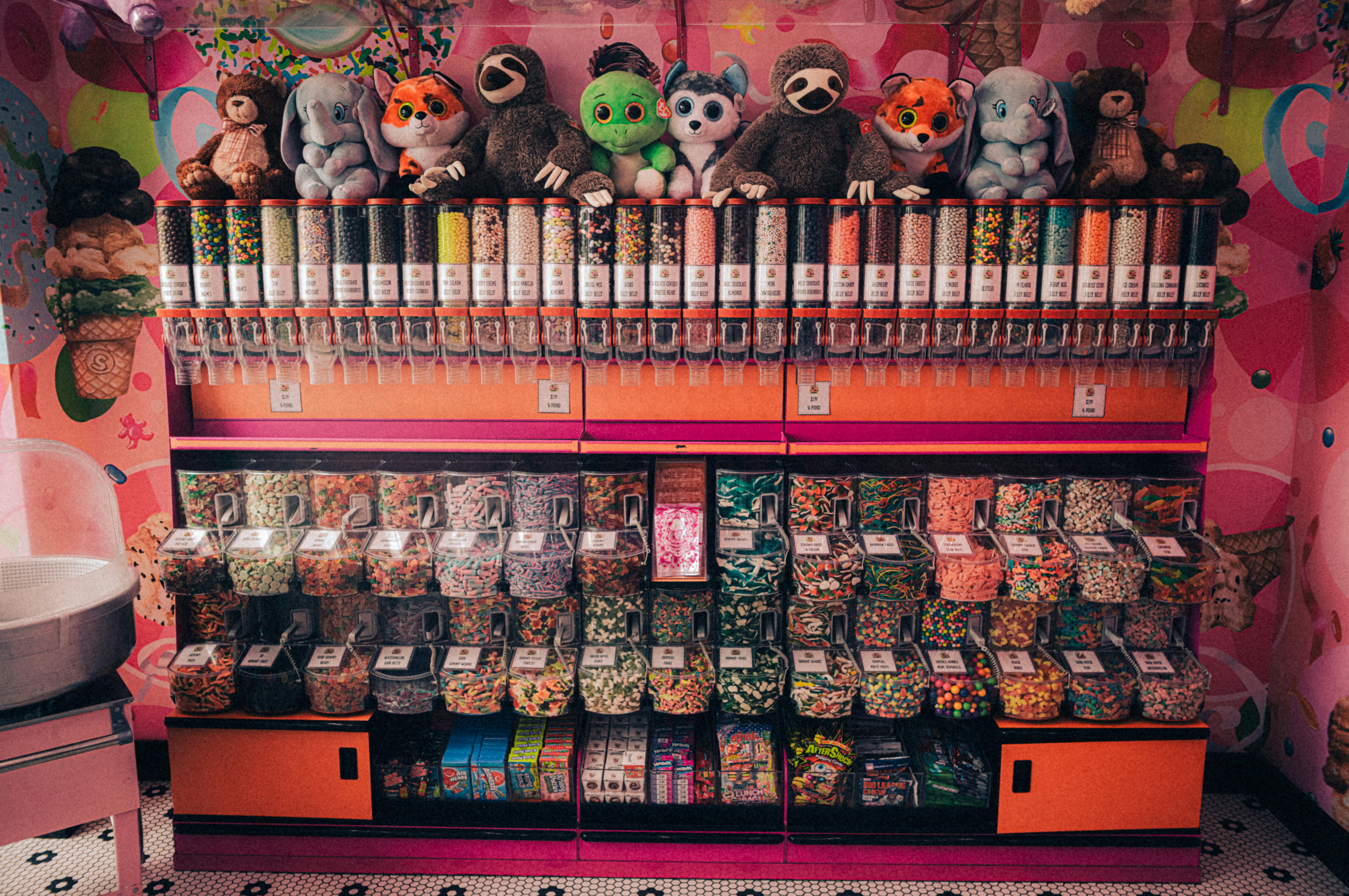 A shelf filled with lots of different items