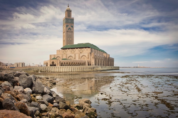 A large building sitting on top of a body of water