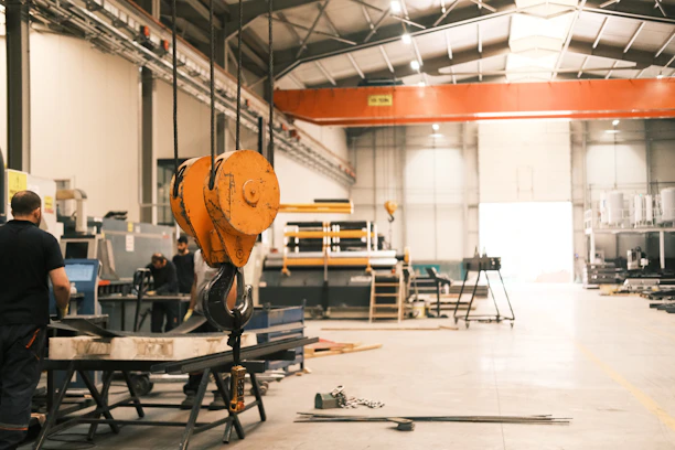 A man working on a machine in a factory