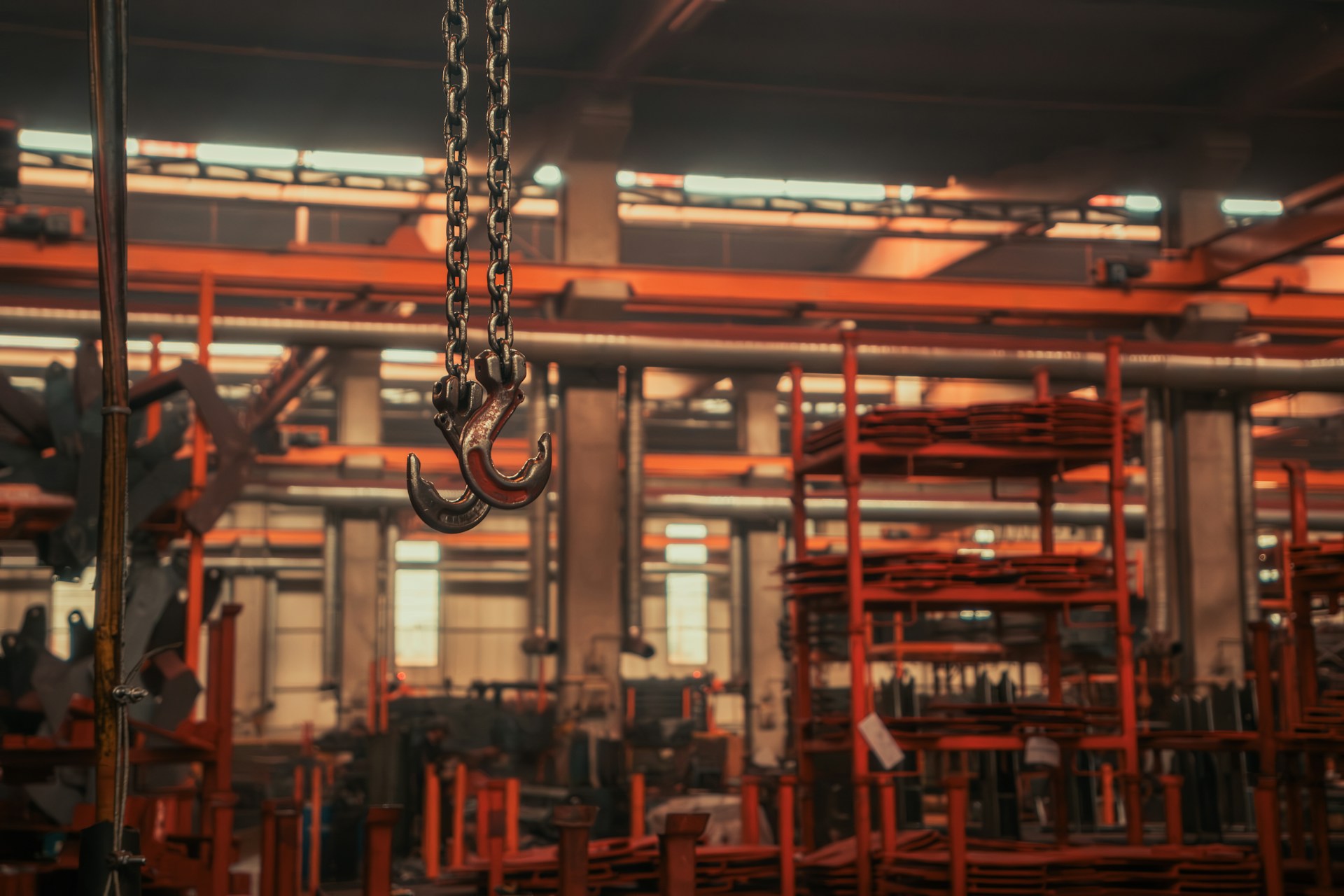 A large industrial warehouse filled with lots of machinery