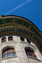 A tall building with a clock on the side of it