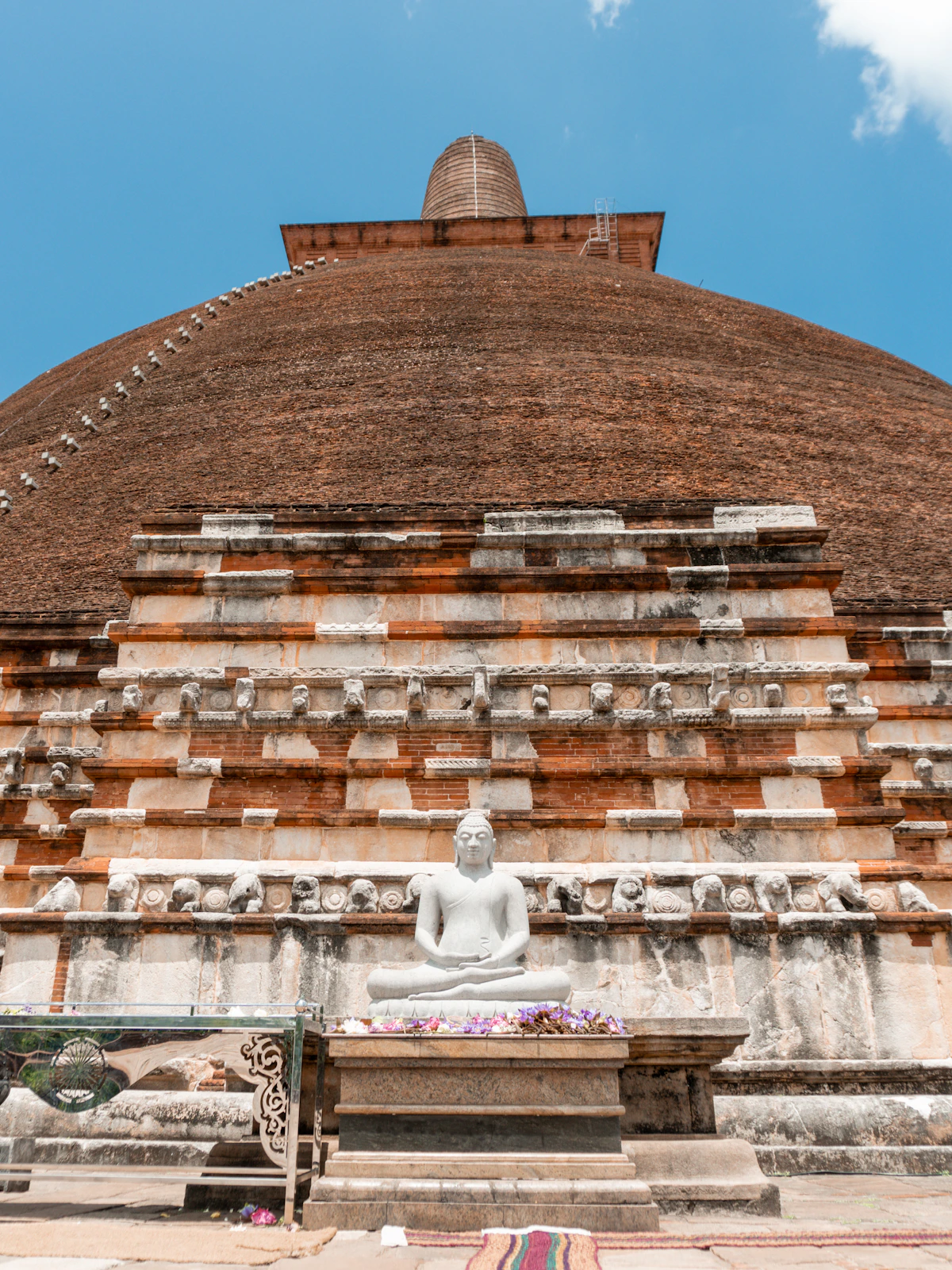 Jetavanaramaya stupa and Buddha statue in Anuradhapura