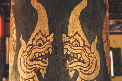 A close up of a vase with designs on it