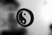 A black and white photo of a yin sign