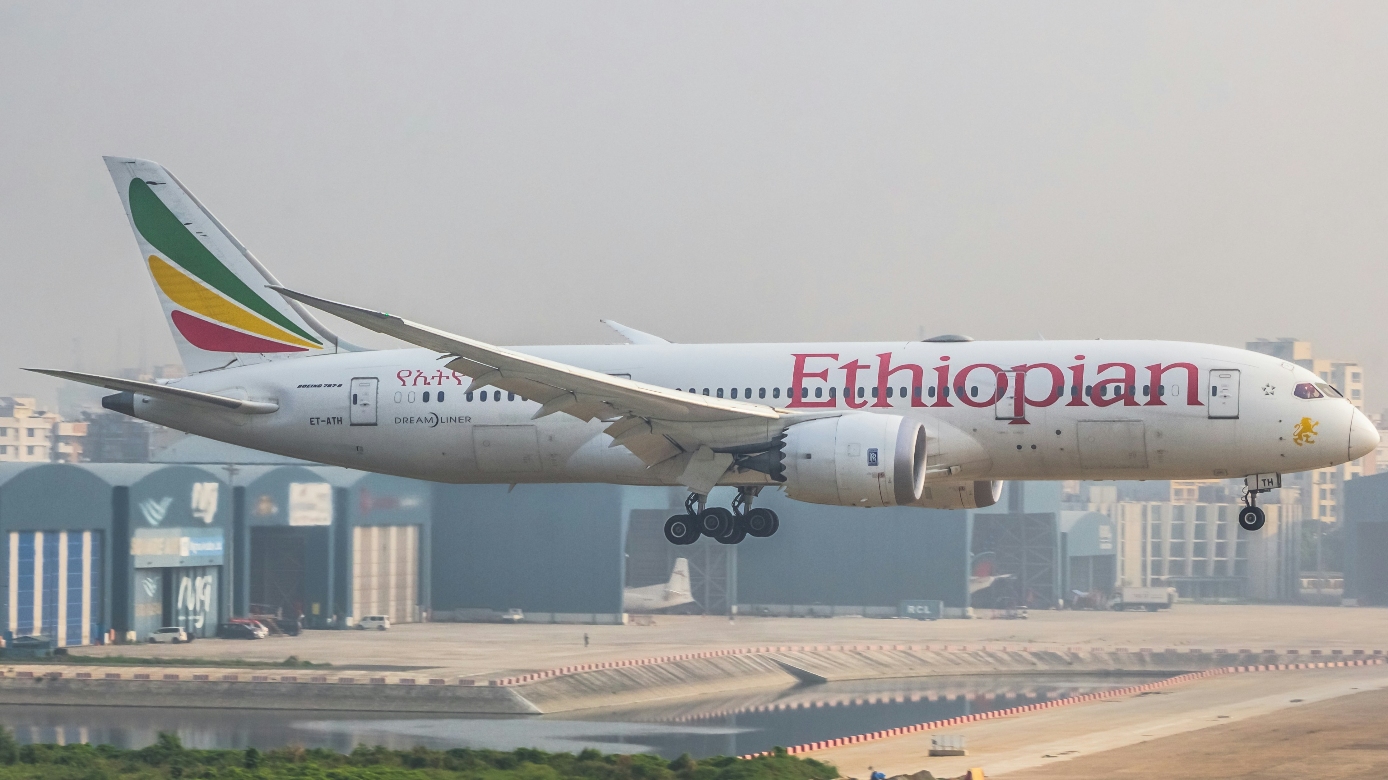 A large jetliner taking off from an airport runway, Ethiopian Airlines first commercial flight to Bangladesh! Addis Ababa to Dhaka. November 3rd 2024. ET-ATH B787-8 Dreamliner.