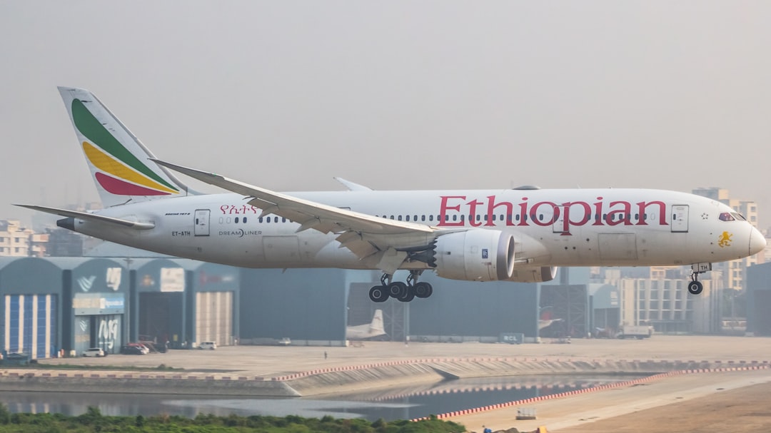 A large jetliner taking off from an airport runway, Ethiopian Airlines first commercial flight to Bangladesh! Addis Abab
