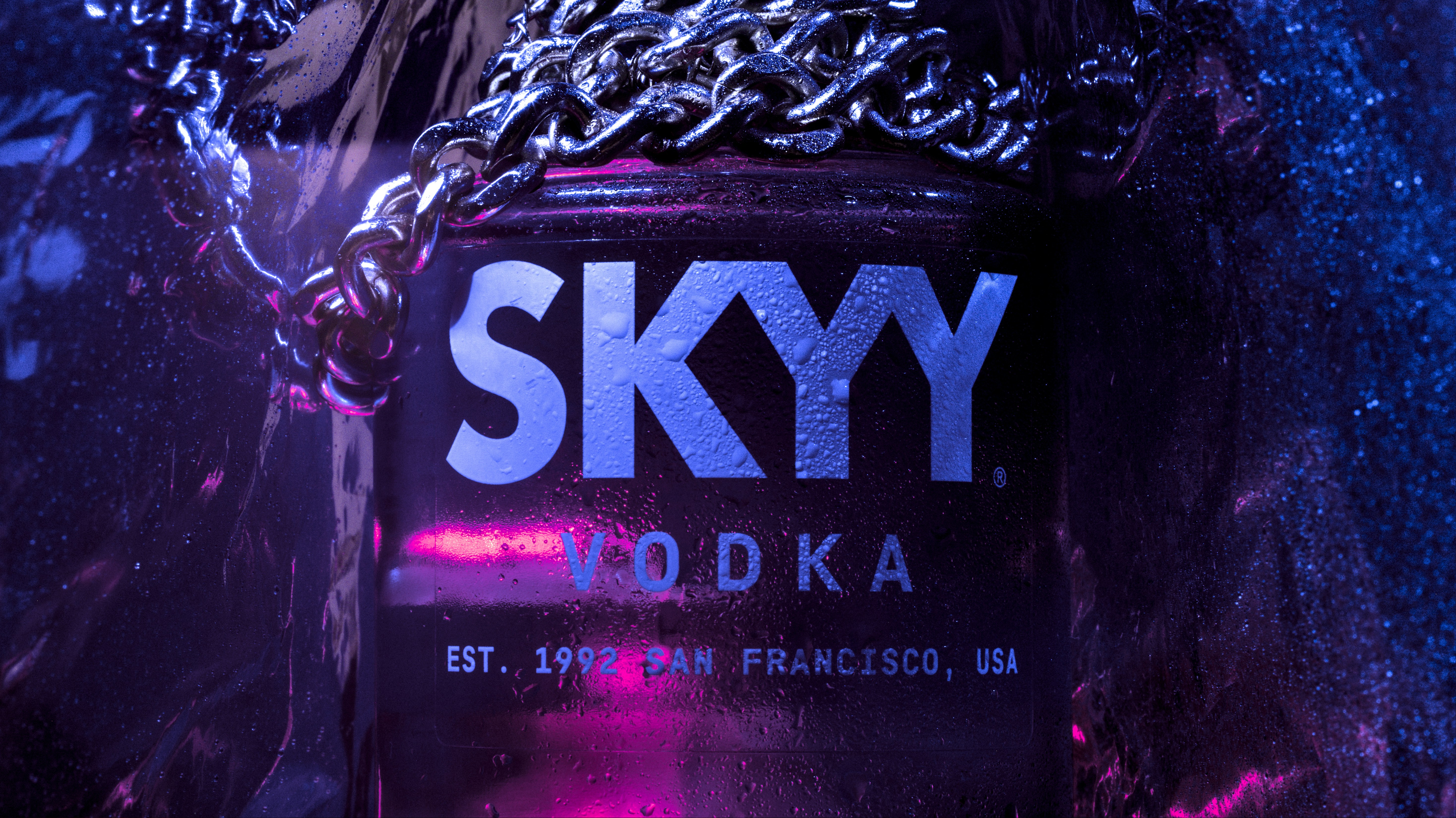 A can of skyy vodka on a chain