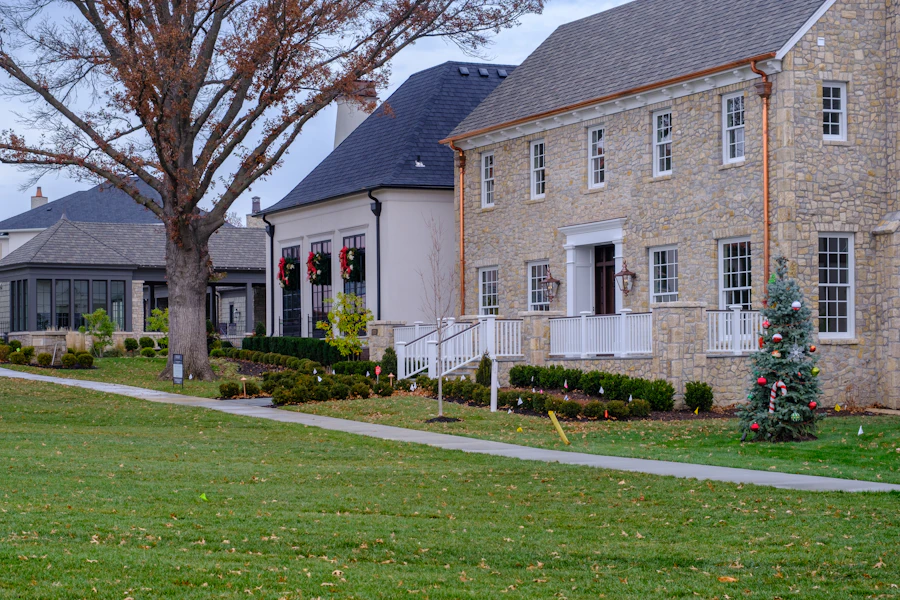 A large stone house on a lawn
