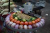 A variety of vegetables are displayed on a tray