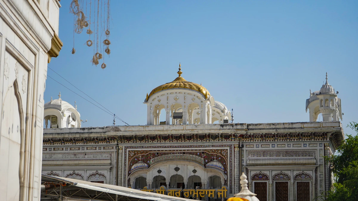 The white and gold facade of the Golden Temple complex in Amritsar