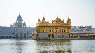 A large body of water with a building in the background