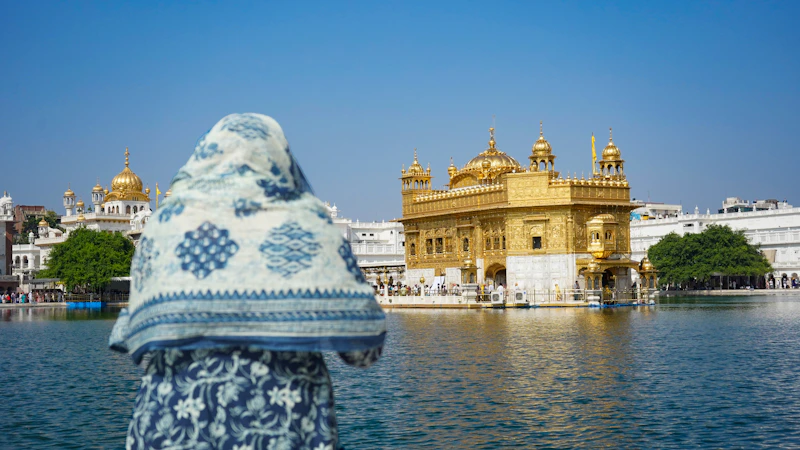 Indian sugar mama by the water, enjoying the view