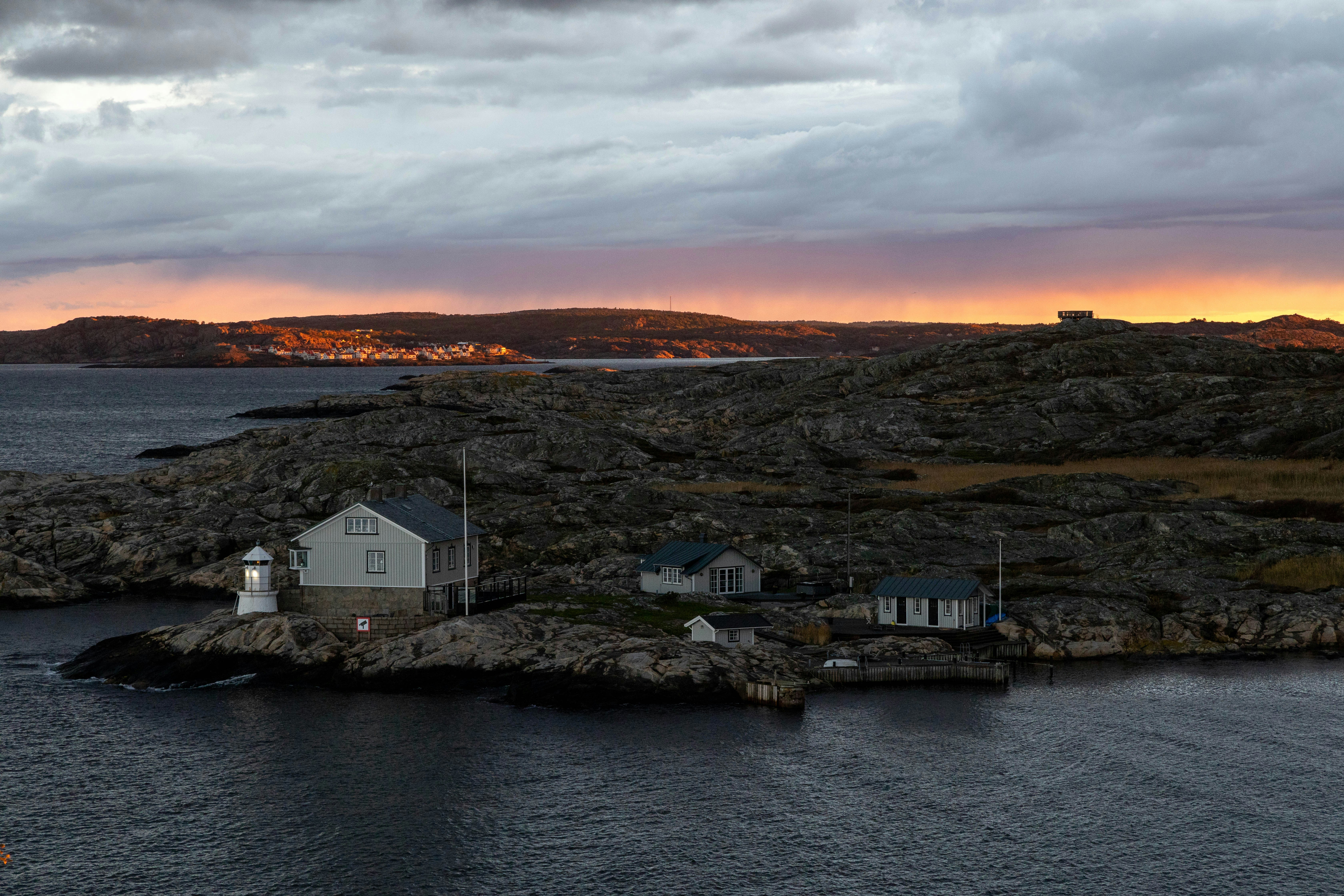 A small island in the middle of a body of water