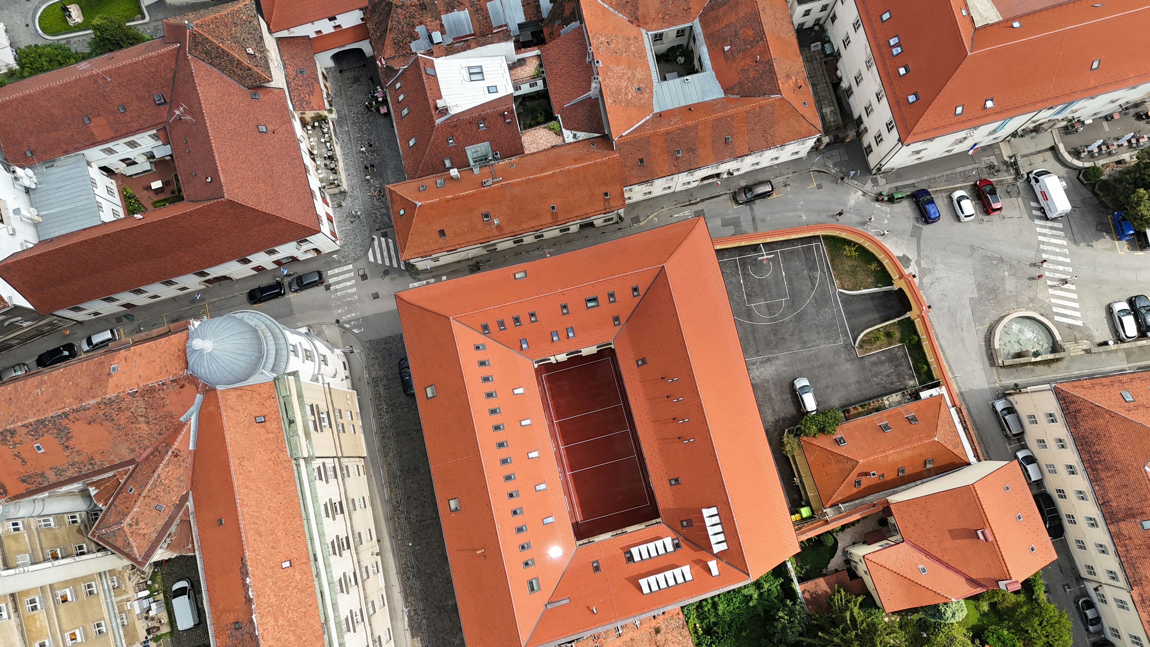 An aerial view of a city with many buildings