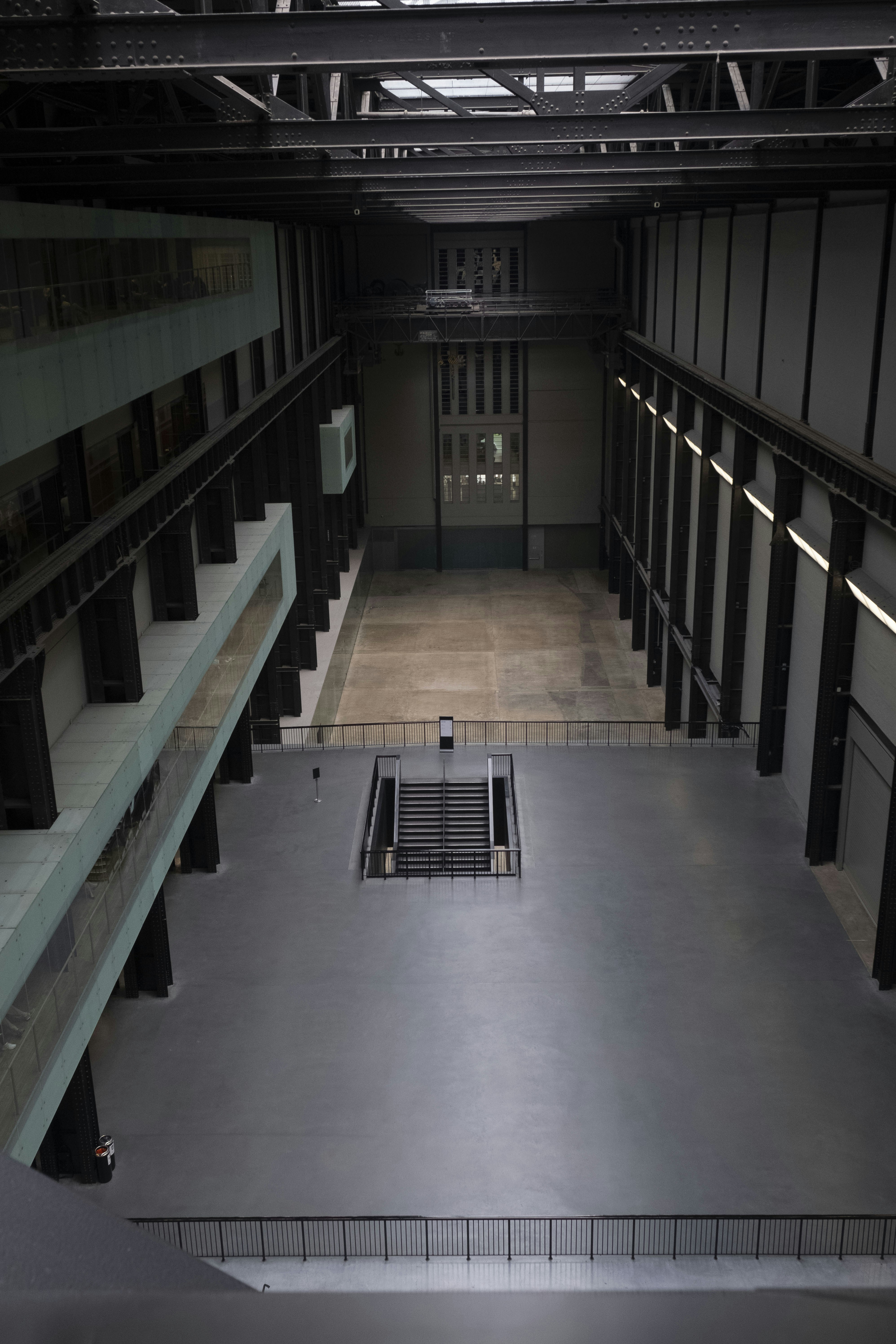 An empty building with a bench in the middle of it